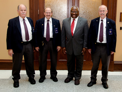 Justice Thomas with Court Security Officers